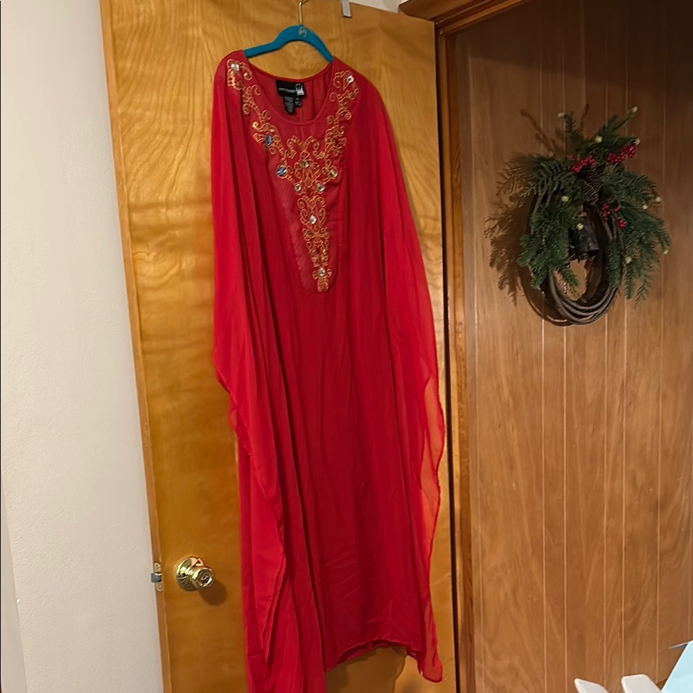 Antthony Red Caftan with Embellished Details for Resort or evening wear.